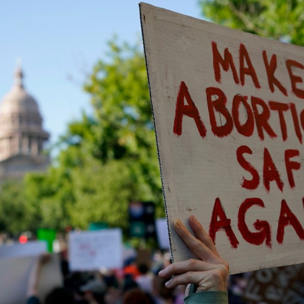 Demonstrators march and gather near the Texas Capitol following the U.S. Supreme Court's decision to overturn Roe v. Wade, June 24, 2022, in Austin, Texas.